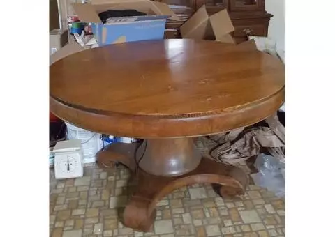 Antique oak table 52" with several leaves