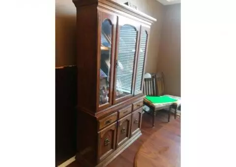 Table and chairs with China cabinet