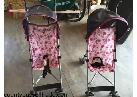 Pair of umbrella strollers