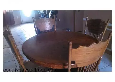 Wooden table with four chairs