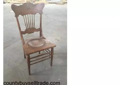 Four antique oak chairs