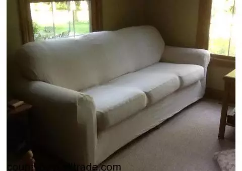 IVORY COVERED SOFA/COUCH BT SMITH BROS.