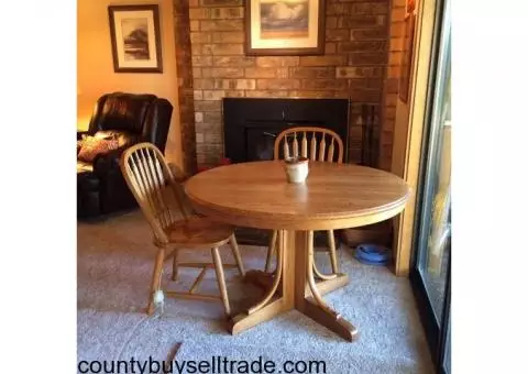 Oak table with 6 matching chairs