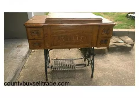 antique sewing machine and cabinet