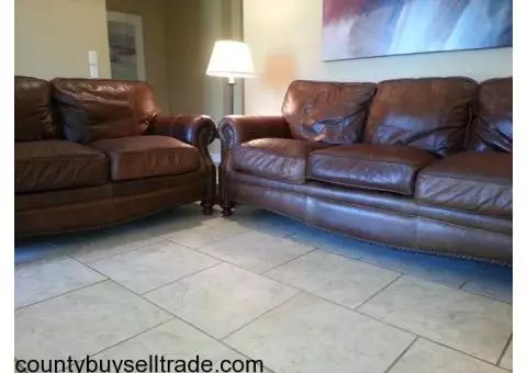 leather couch and loveseat