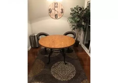 Beautiful Round Kitchen or Dining Table with Ornate Metal Base. Excellent Condition!