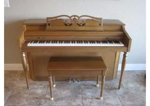 Rudolph Wurlitzer upright piano with bench