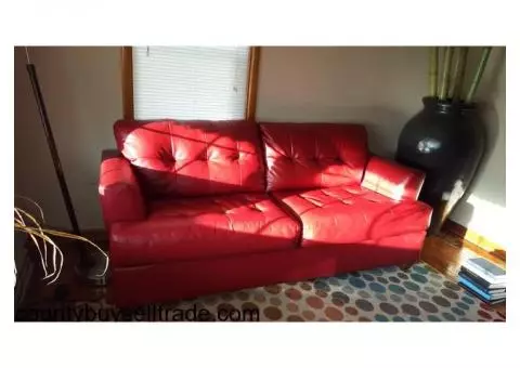 Like new faux leather sofa