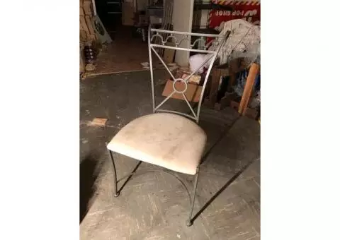 Wrought Iron glass top table and four chairs