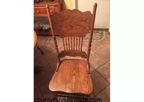 Oak dining table and 6 chairs