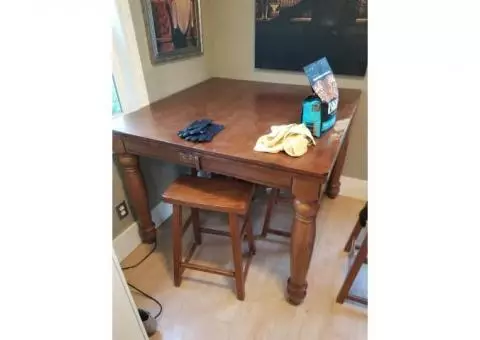 Free Solid wood table with 6 stools.