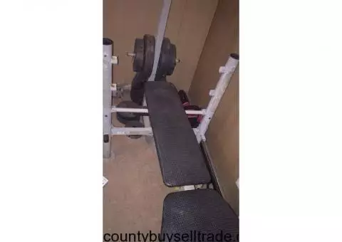 Weight bench 20 pound bar 150+ pounds of weight