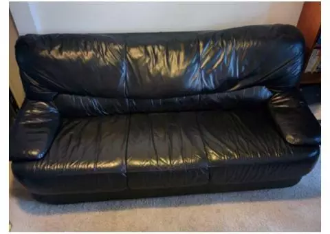 Natuzzi Black Leather Sofa: $75 or best offer.