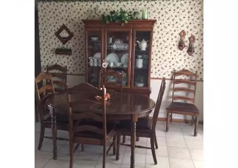 Dining room table, chairs, and hutch