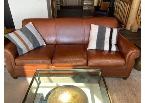 Leather sleeper sofa and two matching recliner chairs