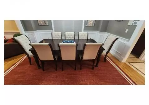 Porter Dining Room Table by Ashley Furniture with 8 chairs