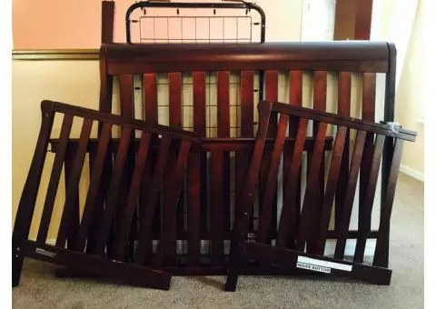 Dark mahogany color Sleigh Crib