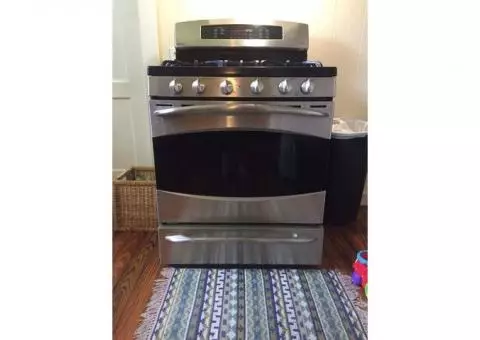 GE profile 30" free-standing gas range with baking drawer.