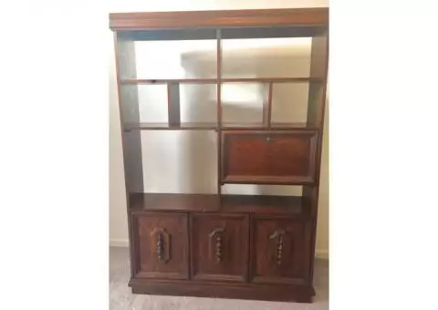 large bookcase with storage and desk