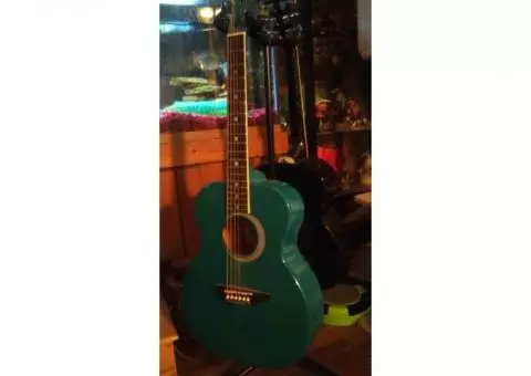 Instruments: AURORA Luna Guitars one Teal one Black used once