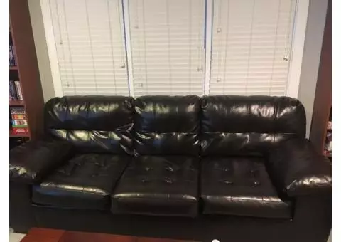 Black faux leather couch for sale