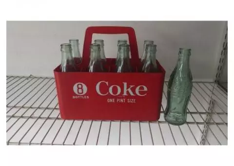 Vintage Coke 8 pack with an extra bottle