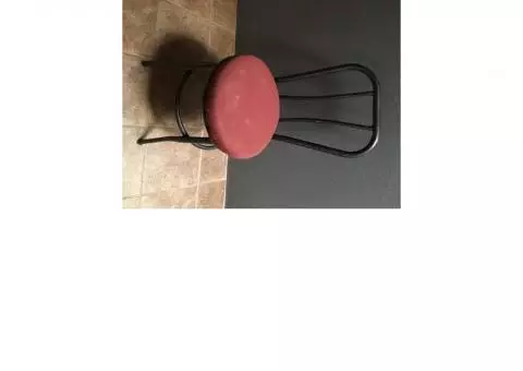 black wrought iron ice-cream chairs