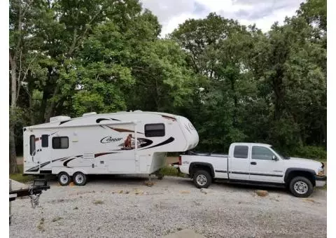 2010 Cougar 5th wheel camper & 2002 Chevy Silverado HD2500 extended cab pick-up.