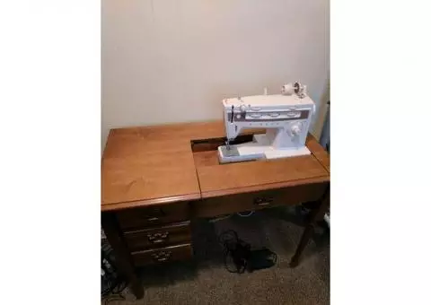 Singer sewing machine with cabinet