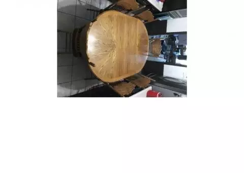 Solid Oak table with 6 chairs and leaf