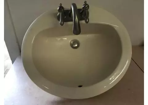 Beige oval bath sinks (two matching)