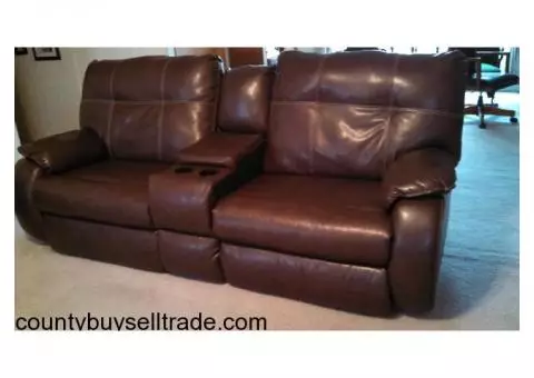 Leather reclining love seat