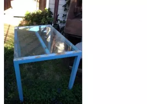 Glass top patio table