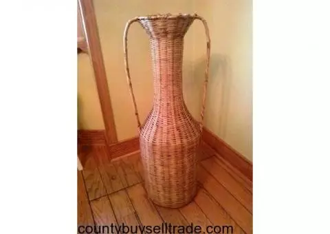 Three foot tall wicker urn/floor vase