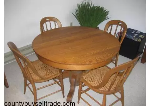 Antique Round Oak Pedestal Table with Caned Chairs